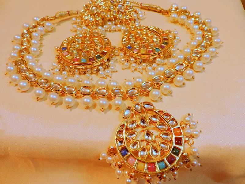 Buy Designer navratna gold plated necklace set Online